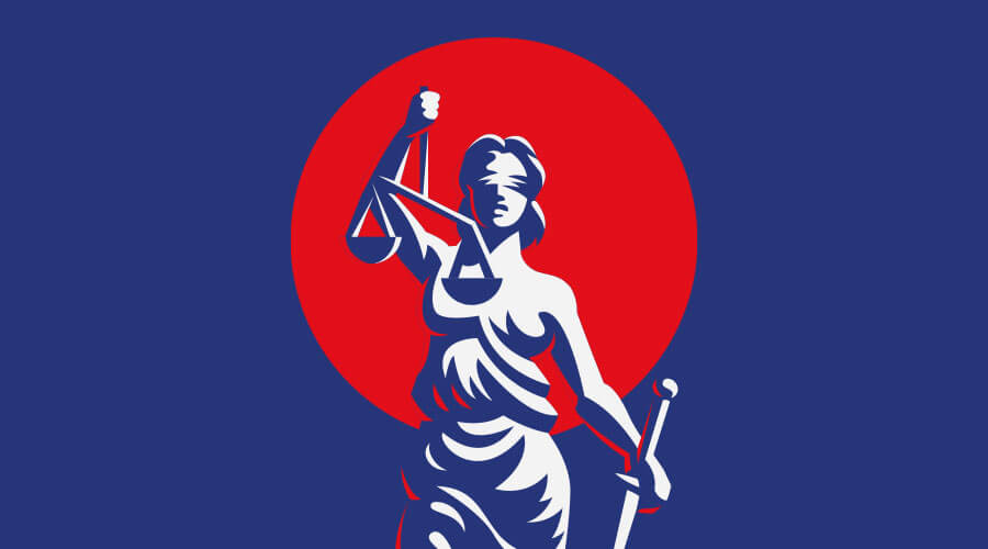 Aktuelle Urteile Statue der Justitia vor blauem Hintergrund mit rotem Kreis.