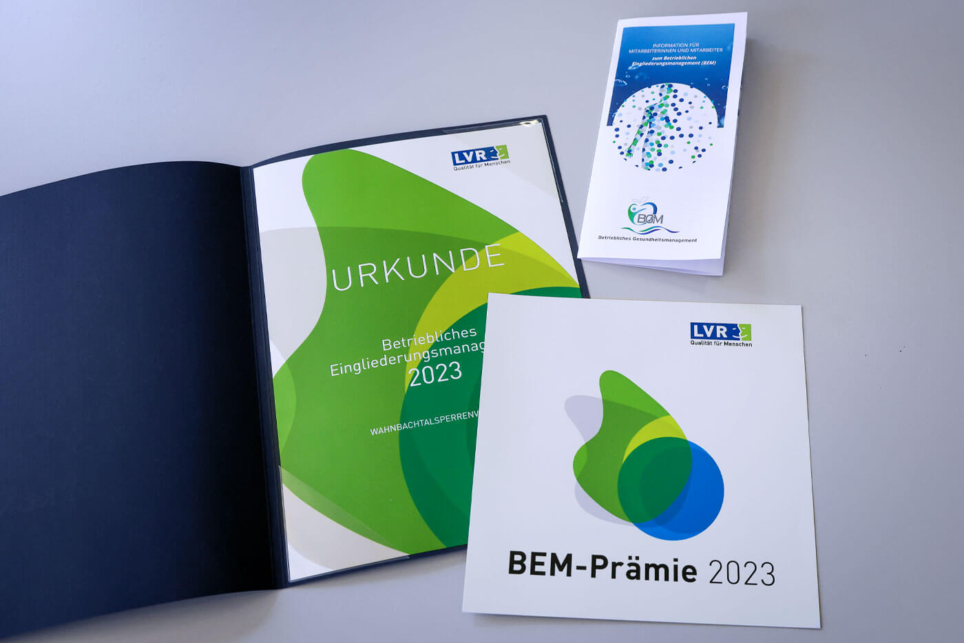 BEM-Flyer und Urkunde für die BEM-Prämie