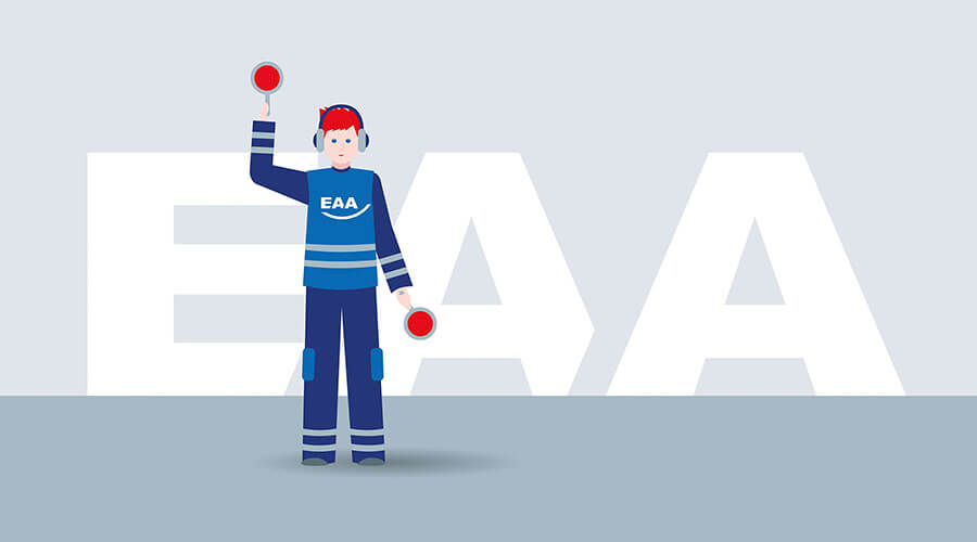 Ein Lotse hinter dem der Schriftzug EAA sichtbar ist